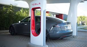 Falling Gas Prices Are Fantastic Unless You Re Tesla Wired Tesla Charging Stations Tesla Motors Car Charging Stations