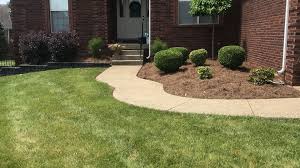 In addition to designing landscape plans, we offer a long list of landscape services, including installation of fire pits and ponds, as well as maintaining customer's landscape. Our Landscaping Work In New Albany In Jeffersonville In Louisville Ky Sean S Lawns Llc