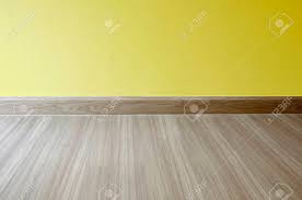 Vinyl floor tiles and sheet flooring for your home or business in the uk, our striking collection will bring colour and. Empty Room Interior Oak Wood Laminate Floor And Yellow Wall Stock Photo Picture And Royalty Free Image Image 83911913
