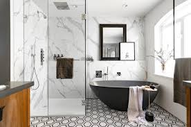 Unique bathroom fittings should be combined with simple looking tiling so they can be at the forefront of your bathroom's design. Eight Residential Bathroom Design Trends For 2021