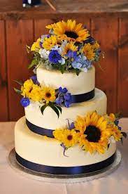 Tips For Looking Your Best On Your Wedding Day Luxebc Sunflower Wedding Cake Wedding Cake Navy Simple Wedding Cake