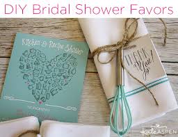 Bridal shower favors or little parting gifts for guests can be as simple or as fancy as the occasion requires. Diy Bridal Shower Whisk Tea Towel Favors Kate Aspen