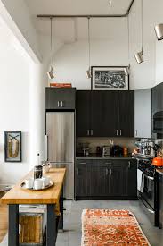 Amazing Rugs Are Just The Beginning In The Beni Rugs Cofounders Dreamy Brooklyn Loft Architectural Digest In 2020 Black Kitchen Cabinets Beni Rugs Cool Rugs