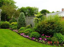 Fencing With Floral Borders Outdoor Flower Ideas Backyard Garden Design Back Small Front Yard Landscaping Backyard Garden Design Backyard Landscaping Designs