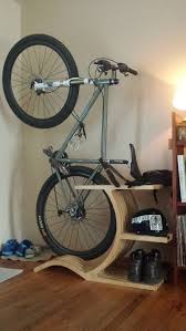Indoor Bike Storage Rack Not Sure I Would Want One But It Sure Looks Interesting Diy Bike Rack Bike Storage Apartment Bike Storage Rack
