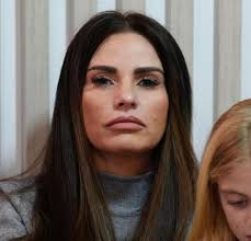Katie Price 'really upset' after botched facelift 'knocked her confidence'  as she recovers at home after second op