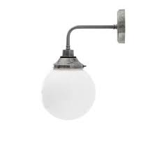 Single light bathroom wall fitting features a neat matt nickel wall mounting supporting a cylindrical opal glass diffuser. Pelagia Opal Globe Wall Light 20cm Ip44 Wall Lights Globe Wall Light Bathroom Wall Lights