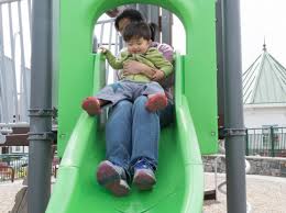 Active boy sliding down free photo. Going Down Slide With Child Is Dangerous Says Research