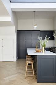 This slick, light herringbone pattern floor works nicely with the deeper brown found in the modern dresser. Herringbone Kitchen Floor Ideas And Inspiration Hunker