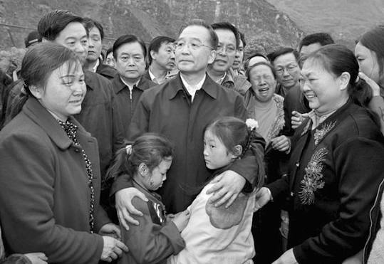 震痛深处的关怀_书摘_光明网