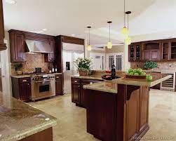 See more ideas about kitchen design, kitchen remodel, kitchen. A Luxury Kitchen With Cherry Cabinets And A Large Island Kitchen Backsplash Designs Kitchen Design Luxury Kitchen Design