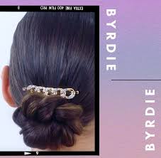 Wrap hair around the base of your bun and pin it in place. Watch Two Easy Low Bun Hairstyle Tutorials