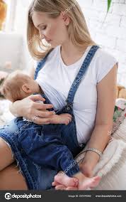 Mother Breastfeeding Her Baby Mother Feeding Baby Breast Milk Child ⬇ Stock  Photo, Image By © Golyak #251979562