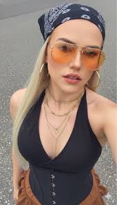 Create an ultra HD image from the attached image. Long blonde hair wo...