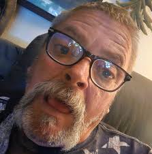 Dark Themed Gothic Food Truck with Skull Artwork and Horns.