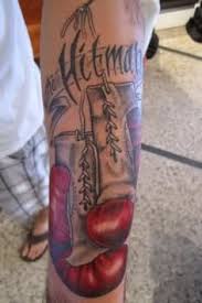 Crown tattoos can be designed in many ways, incorporated with jewels, diamonds, crystals, and other. Hitman Red Boxing Gloves Tattoo On Sleeve Site Title