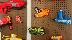 Make this easy diy nerf gun storage rack out of pvc pipe to hang them all in one place! Diy Pegboard Nerf Gun Storage Moments With Mandi