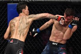 Бой в рамках турнира ufc on abc 1 или ufc fight island 7. Max Holloway Bloodies Batters Calvin Kattar To Put On Five Round Clinic In Ufc Fight Island 7 Main Event Mma Fighting