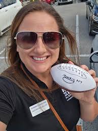 What's more exciting than signing a football? Being part of the 2025 Walk  to End Alzheimer's Pinellas! Florida Blue is energized for Walk Day,  driving positive change. We appreciate our Development Coordinator,