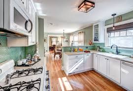 The problem can be solved by installing a half wall with a glass partitioning on top that functions as an open kitchen all at the same time. Half Wall Kitchen Houzz