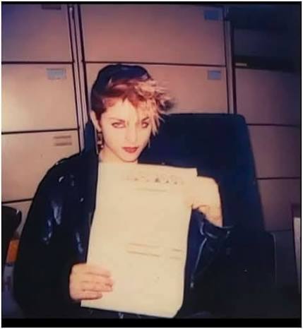 Photos of first record deal signing in 1982