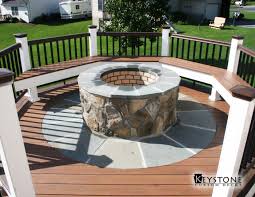 Firepit for wooden decks made of solid material like iron, cast iron, or steel that are eligible for use in any ground without harming that. Custom Fire Pit Integrated Into A Timbertech Deck Built By Keystone Custom Decks Deck Fire Pit Portable Fire Pits Gas Fire Pits Outdoor