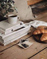 A Quiet Sunday Moment With Some Of My Favourite Things Bare Floorboards Vintage Photographs A Sta Coffee And Books Book Photography Bookstagram Inspiration