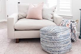Chair and ottoman are upholstered in soft velvet fabric on hardwood frame and dark stained wooden legs. The Most Comfortable Oversized Chair Christene Holder
