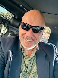 What is the value of a 2021 Tesla Model Y with 103K miles?