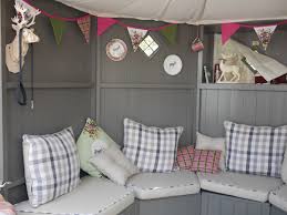 14 summer houses that are prettier than hotel rooms. Pretty Summerhouse Interior With Seating Upholstery Small Summer House Summer House Summer House Interiors