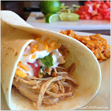 Sprinkle a little on taco salads or in chicken quesadillas. Slow Cooker Shredded Chicken Tacos And Burritos Sweet Little Bluebird