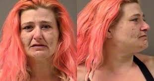 Woman charged with whipping her son, hitting him in the face