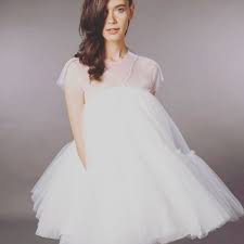 It is also available in a floor length version. Short Baby Doll Wedding Dress Fashion Dresses