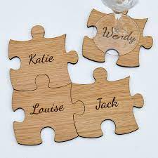 Each piece can be engraved with a bespoke message on the front and there is also the option to add a message that goes across. Personalised Oak Wooden Family Jigsaw Puzzle Piece Coasters Join To Make Set Rustic Personalized Puzzle Pieces Family Christmas Gifts Jigsaw Puzzle Pieces