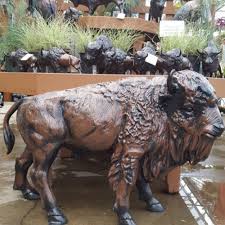 Meanwhile my brother is jumping off and getting back on over and over again! Buffalo Statue Gullo S Garden Center