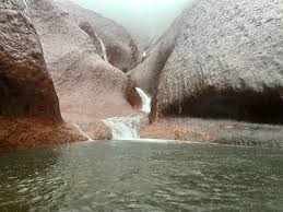 But there's much more to kno. Uluru Waterfalls Rain Brings Unique Sight To Australian Landmark Bbc News