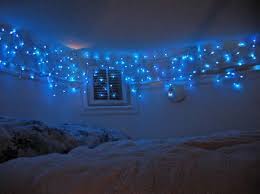 12 Cool Ways To Put Up Christmas Lights In Your Bedroom Christmas Lights In Bedroom Blue Fairy Lights Blue Rooms