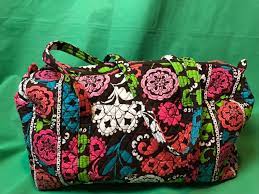 A retro inspired yet totally fresh floral blooms print on 100% cotton. Vera Bradley Lola Retired Pattern Brown Multicolor Flowers Duffel Overnight Bag Clothing Shoes Accessories Wom Vera Bradley Purses For Sale Overnight Bag