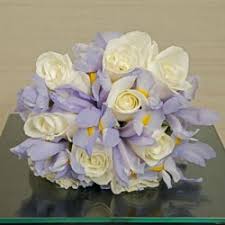 Packages often include helicopter transportation from las vegas, flowers, cake, photos, and bubbly, as well as the license and officiant fees, which aren't usually included with chapel weddings. Bridal Bouquets Bridal Flowers Las Vegas Chapel Of The Flowers