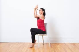 10 Yoga Poses You Can Do In A Chair Chair Pose Yoga Yoga Poses Yoga Postures