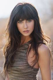 The full side swept bangs is the way to go. 20 Eye Catching Hairstyles With Bangs Sofistyhairstyle Hair Styles Long Hair Styles Long Hair With Bangs