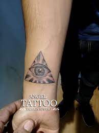 The Eye Of Providence Tattoo Made At Angel Tattoo Design Studio Gurgaon Eyetattoo Eyeofprovidencetattoo Triangle Tattoos Tattoo Designs Providence Tattoo