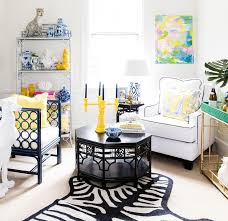 The height of an accent table affects both its look and function. Black Bamboo Octagon Coffee Table With Yellow Candle Holder Transitional Living Room