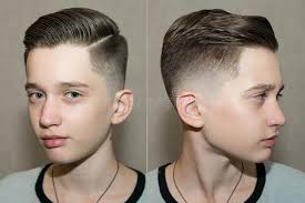 High fade is one of its trendiest variations. Stylish Modern Retro Haircut Side Part With Mid Fade With Parting Of A School Boy Guy In A Barbershop On A Brown Background Stock Photo Image Of Cheerful Haircut 161348360
