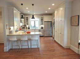 Mondays With Love Our Kitchen With Peninsula Bar Off White Shaker Cabinets Black Hardware In Latches Kitchen Layout Kitchen Designs Layout Kitchen Remodel