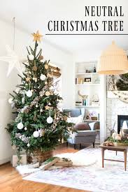 The weathered effect and the twine make these decorations look old, and this can bring together a room if you feel that your walls are too barren. Neutral Christmas Tree Decoration So Pretty