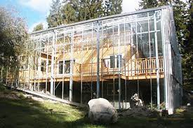 Sheltering your greenery also keeps pests out and reduces the risk of disease. Naturhus An Entire House Wrapped In Its Own Private Greenhouse