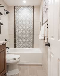 Durable, waterproof and resistant to mold, germs and bacteria, glazed tile, like ceramic and porcelain, encaustic tile, like cement, and natural stone tile are all beautiful choices for bathroom flooring, walls and shower surrounds. The Shower Wall Features A Center Panel With Accent Tiles From Cement Tile Shop In The Style Pa Tile Accent Wall Bathroom Tile Accent Wall Bathroom Accent Wall