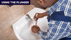 a sink clogged with coffee grounds