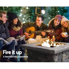 Known for its timeless elegance and beauty, flagstone, when used in patios and complemented with fire pits, makes for a classic, earthy, and relaxing outdoor space. Grillz Fire Pit Outdoor Table Charcoal Garden Fireplace Backyard Firep Capstone Unique